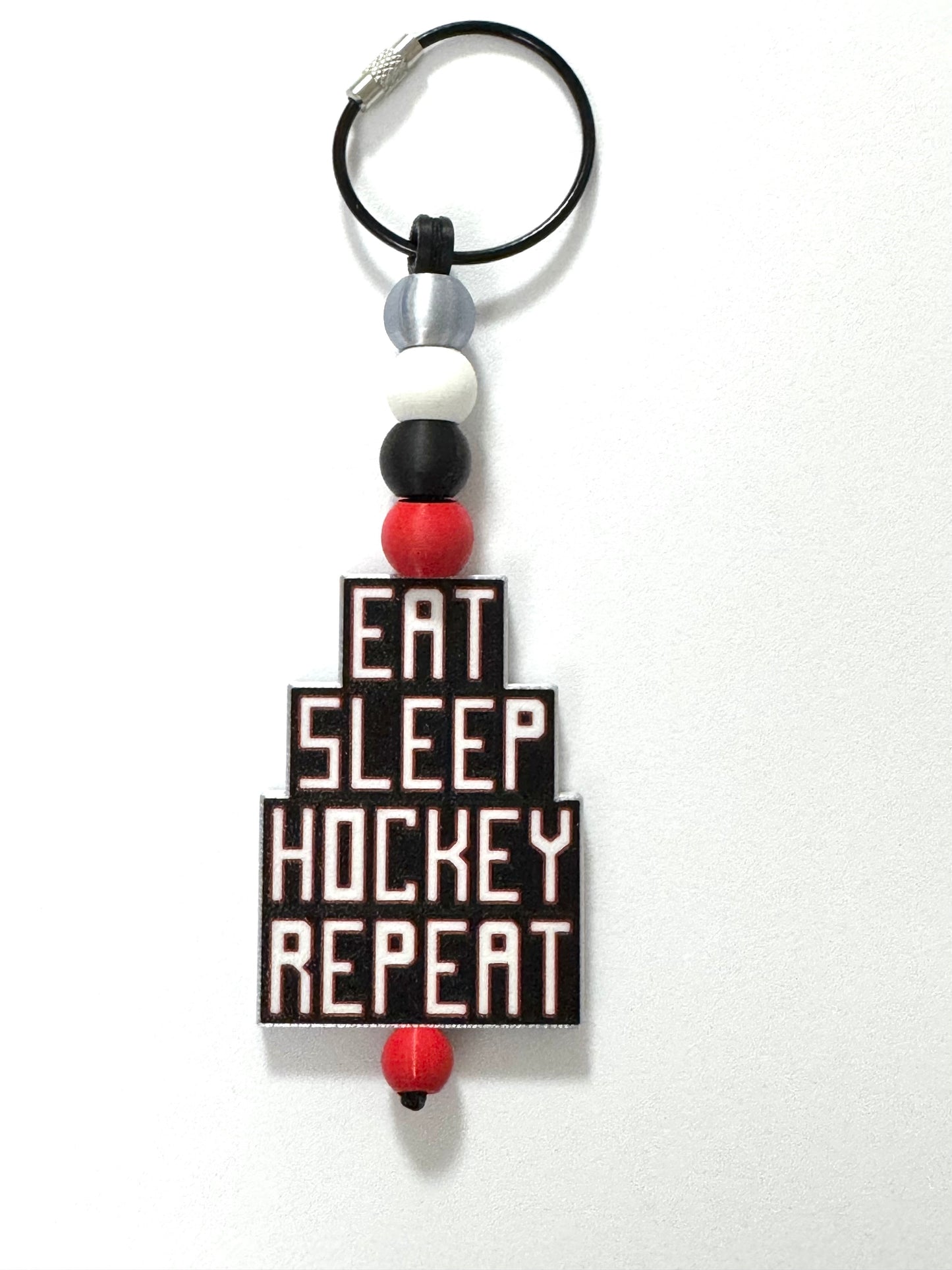 EAT SLEEP HOCKEY REPEAT KEYCHAIN