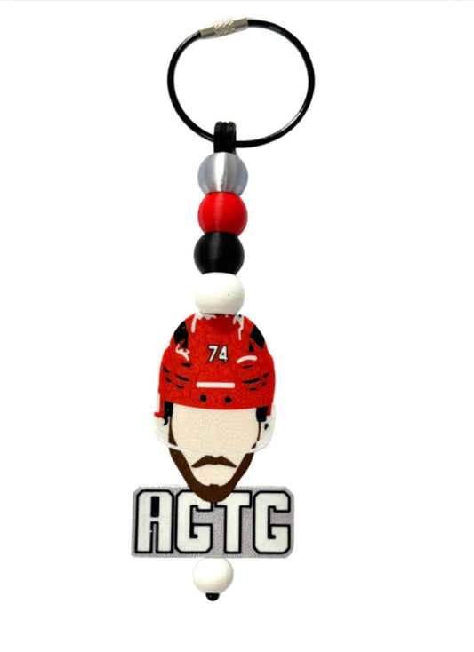 Jaccob Slavin “AGTG” keychain