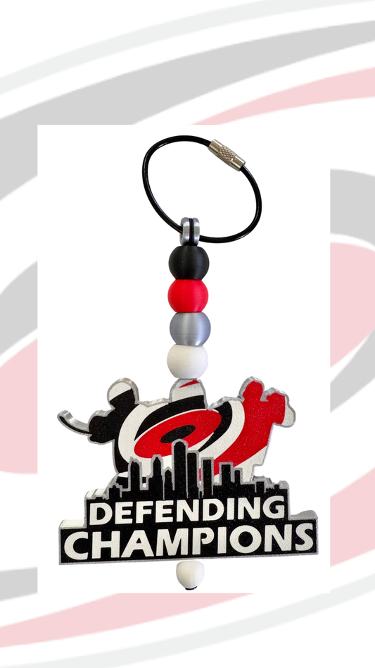 Defending Champs keychain 2026